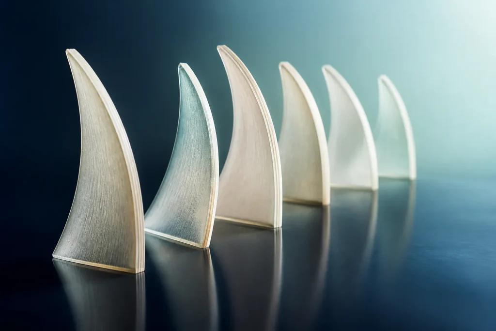 Illustrative translucent curved layers lit against navy